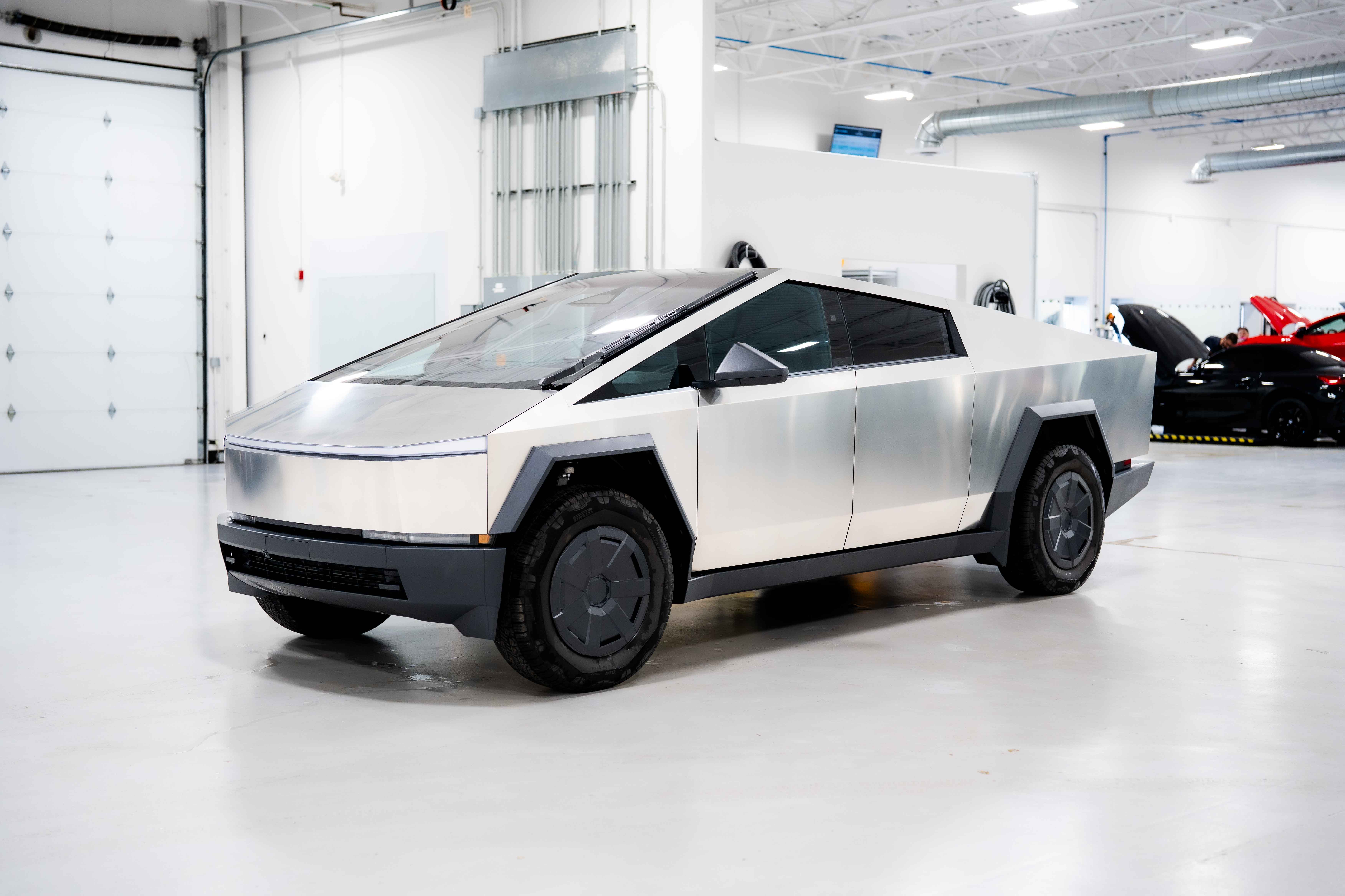 A Tesla Cybertruck with Xpel Window Film Tint, Ceramic Coating, and Paint Protection Clear Bra Film