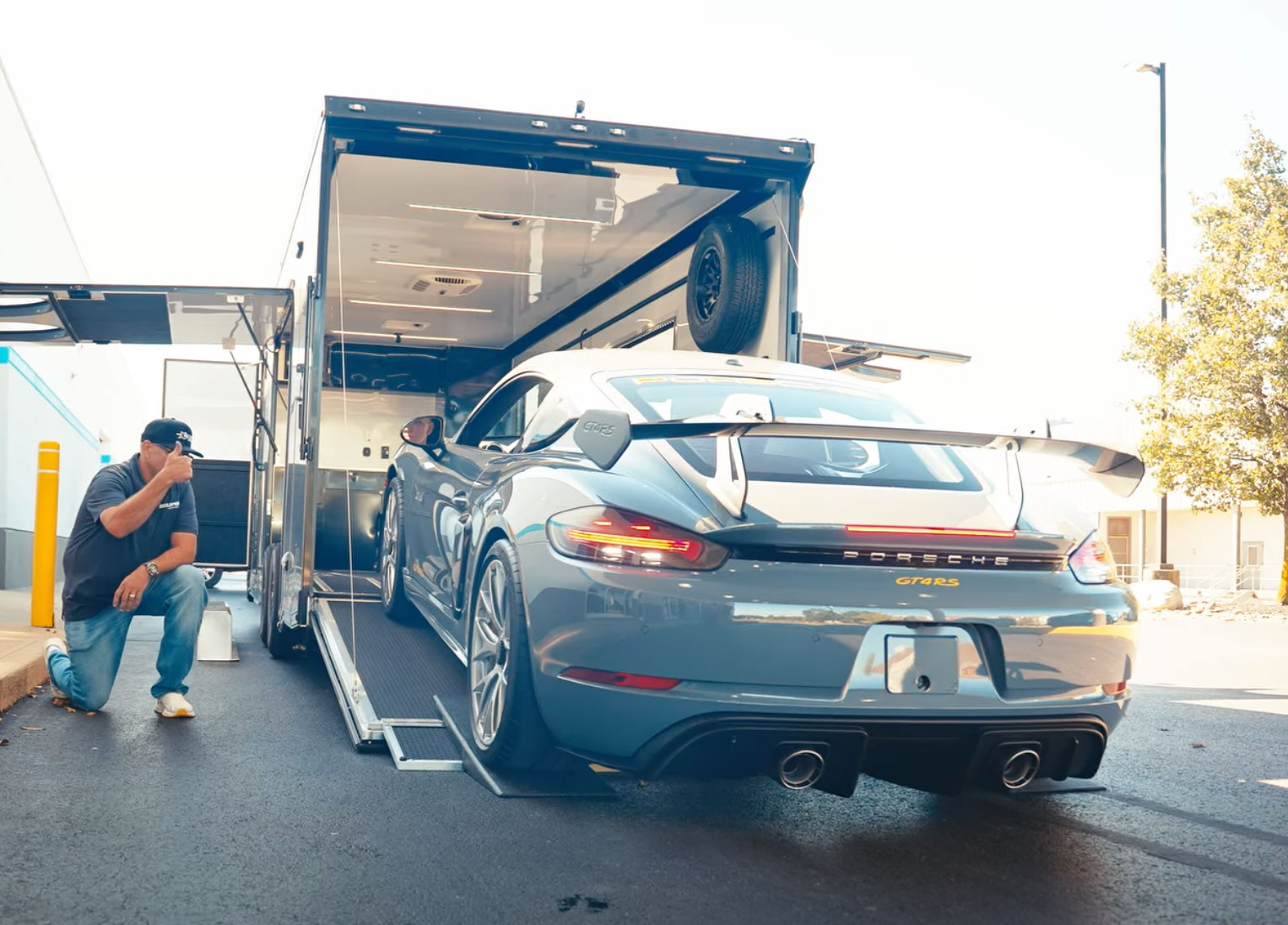Professional ppf installer unloading Porsche 911 in Cincinnati, Ohio.