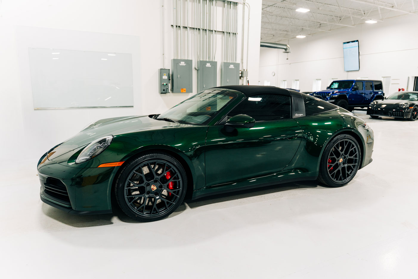 Green Porsche 911 with PPF and Window Tint.