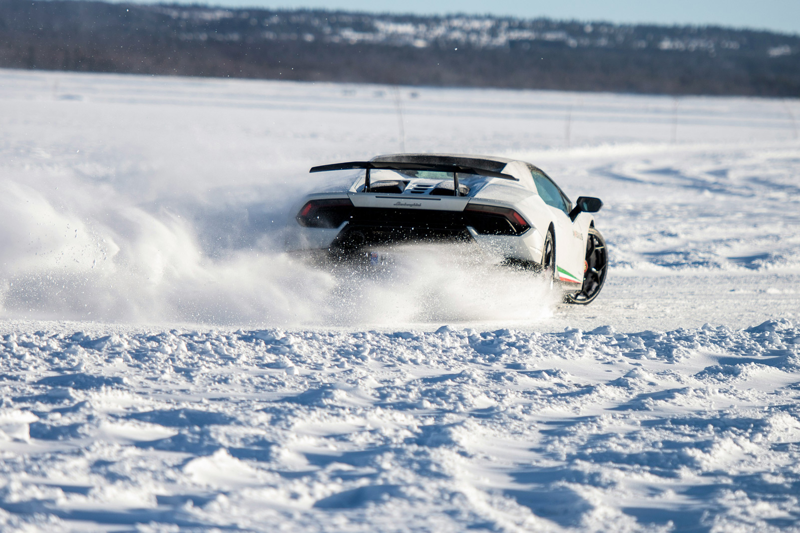 White Lamborghini in Cincinnati winter with car tint